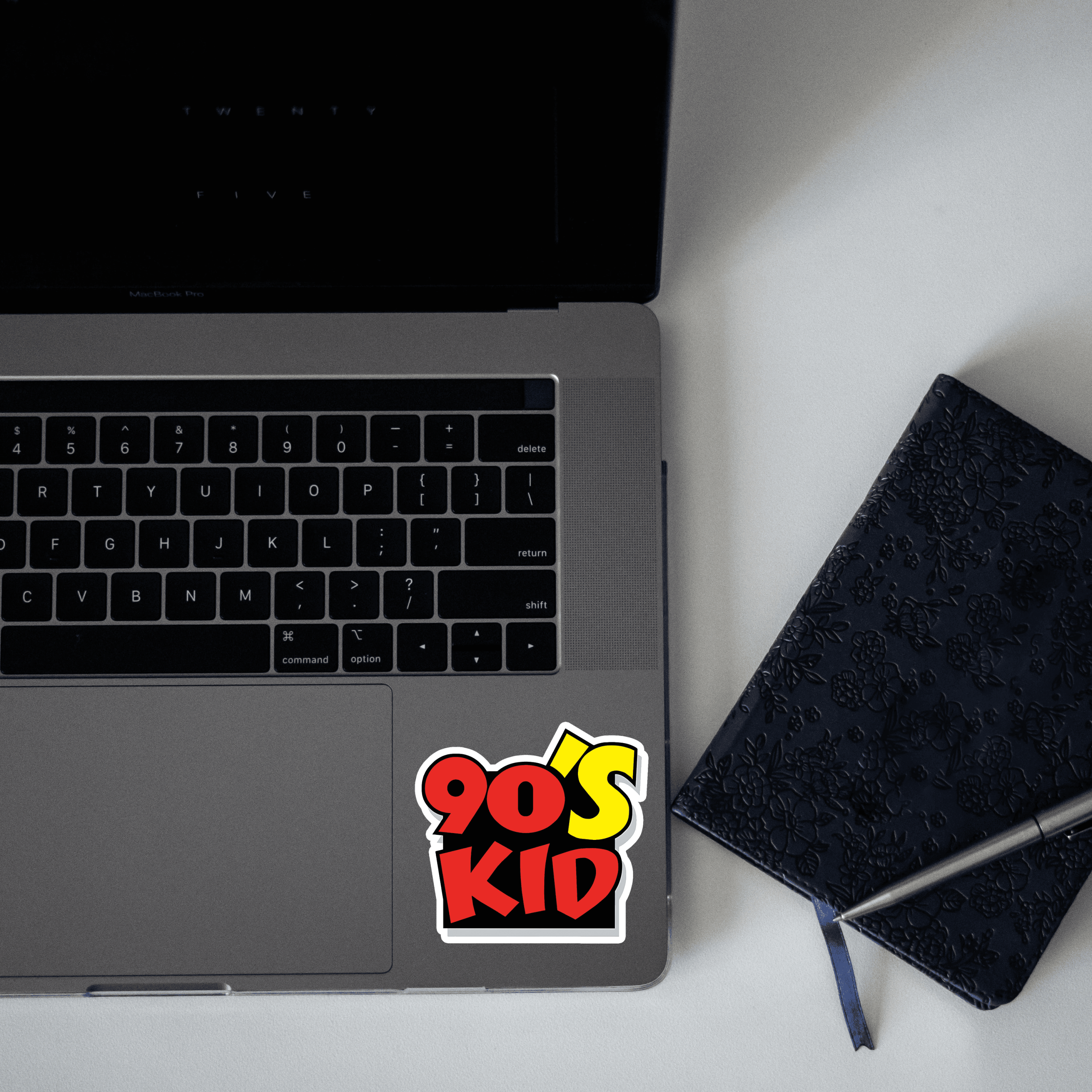 Sticker_on_Laptop_Mockup-scaled-1.png